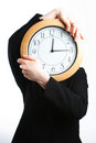 time - photo of man holding a clock