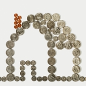 house - photo of coins forming shape of house