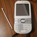 Palm Centro - Here&#039;s a picture of my cell phone which is a Palm Centro. I got it in white because I loved the green on it. It comes with a stylus and everything. It took me a while to learn to use it, but I love it. I would recommend it to anyone.