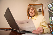 working online at home - photo of woman working online at home