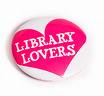 yup, thats me - Picture of a white button pin with pink heart reading "library lovers"