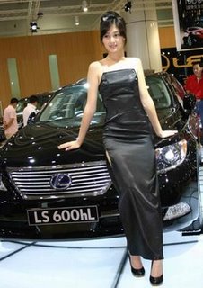 lexus - a lexus & a chines model pose in china auto show