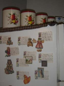 My Fridge - My Fridge with vintage canisters on top, and magnets holding recipe cards on the side.