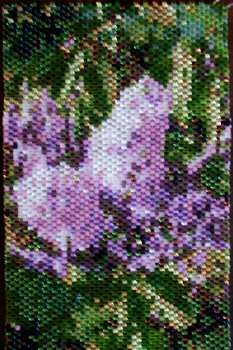 My Lilac peyote tapestry - I took a picture of my lilacs this spring and converted the picture into a peyote pattern. I was going to make it into an amulet bag, but I may use it for a cell phone carrier when I get the back finished. 