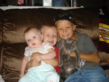 my 3 babies! oh and my oldest sons kitten :) - joey(8) Justin (2) and Sierra (5months)