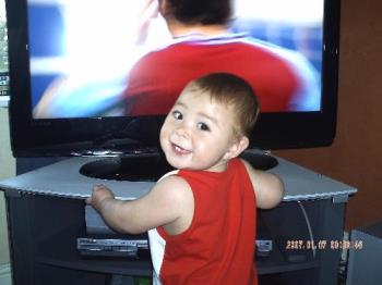 baby watching tv - my baby zach watching telly too close to tv. 