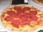 Pepperoni on pizza - A picture of a pepperoni pizza. This is a favorite of mine.