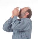 Man sneezing - An image of a man about to sneeze. 