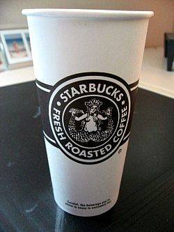 Cup of starbucks coffee - new design of starbucks cup. Cup of starbucks coffee - new design of starbucks cup.