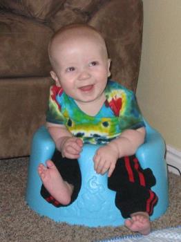 Baby Noah - Baby Noah smiling like always. Oh how cute he is sitting in his bumbo chair.