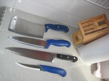 My kitchen tools - Blue handle knives are tupperware brands. Black handle knife no brand but is still as good.