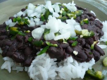 Black Beans. - A plate of delicious black beans and rice.