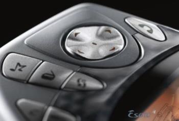 Nokia N-Gage Directional Pad and other Phone Featu - Answers call, Directional, Music, Radio and Menu Button.
The original phone's taco-shaped design was considered clumsy: to insert a game, users had to remove the phone's plastic cover and remove the battery compartment as the game slot was next to it. Another clumsy feature was the speaker and microphone being located on the side edge of the phone. This often resulted in many to describe it as if one was talking into a "taco phone" or "Sidetalking", or simply that they had one very large ear, because the user held the edge of the phone against the cheek in order to talk into it. The comfort factor of lengthy calls was also called into question. Despite the criticism, it is thought that the speakers were there for a practical reason: if placed elsewhere, the screen would get in contact with the cheek and become smudged. However, almost all other cell phones have the screen against the cheek when the user is talking. Despite the questionable practicality, gamers were still unwilling to talk in such an awkward manner.
- wikipedia.org Nokia N-Gage Directional Pad and other Phone Featu - Answers call, Directional, Music, Radio and Menu Button.
The original phone's taco-shaped design was considered clumsy: to insert a game, users had to remove the phone's plastic cover and remove the battery compartment as the game slot was next to it. Another clumsy feature was the speaker and microphone being located on the side edge of the phone. This often resulted in many to describe it as if one was talking into a "taco phone" or "Sidetalking", or simply that they had one very large ear, because the user held the edge of the phone against the cheek in order to talk into it. The comfort factor of lengthy calls was also called into question. Despite the criticism, it is thought that the speakers were there for a practical reason: if placed elsewhere, the screen would get in contact with the cheek and become smudged. However, almost all other cell phones have the screen against the cheek when the user is talking. Despite the questionable practicality, gamers were still unwilling to talk in such an awkward manner.
- wikipedia.org
