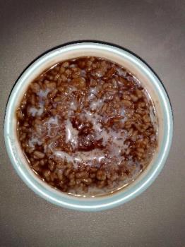 eating food - champorado eating food - champorado