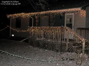 My House - Christmas lights lit up and a fres snow fall happening as well. 