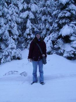 Girlfriend surrounded by lots of snow - Snow snow snow - this is what we saw at the mountains this weekend in Predeal, Romania. My girlfriends seems overwhelmed by snow, but in fact we were both enjoying it.