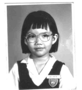 me at the age of 6  - a black & white photo of me at the age of 6