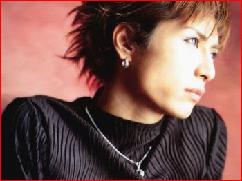 Gackt - yes he is a male, and yes a very great singer. Great Japanese artist:)