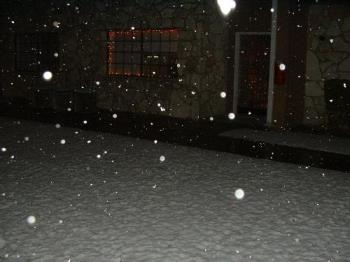 a picture of snow in the courtyard, while its snow - a picture of snow in the courtyard, while its snowing now