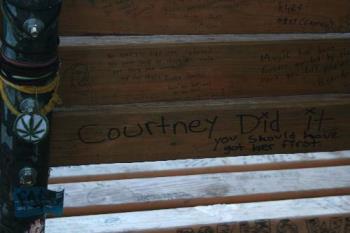 Courtney Did It - A graffiti written on a bench at Viretta park, just beside kurt Cobain&#039;s mansion, saying "Courtney did it"! I believe she has something to do with it.