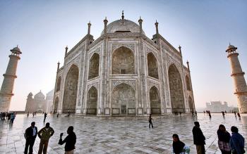 Taj Mahal - Viewed from North West of Taj Mahal.

Described by the Indian classical poet Tagore as a "tear on the face of eternity" - the Taj Mahal is undoubtedly the zenith of Moghul architecture and quite simply one of the world&#039;s most marvellous buildings. Volumes have been written on it s perfection, and its image adorns countless glossy brochures and guide books; nonetheless, the reality never fails to overwhelm all who see it, and few words can do it justice. 