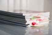 A stack of magazines - photo of A stack of magazines