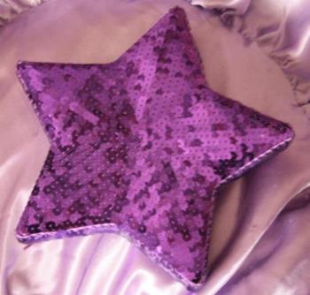 Purple sequins  - purple sequins on the lid of box of chocolates....