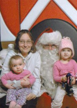 santa - me and the girls with santa.. daddy is missing!