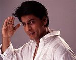 SRK: The KING of Bollywood - Picture of Shahrukh Khan in classic pose. SRK, as he is called, is one of the biggest box office draws in Bollywood.