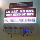 charging cell phones - shows how often people need to charge cell phones. this picture shows a charging station in a popular fast food chain.