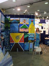 me at the art expo - me and a selection of my paintings at the brisbane art expo.