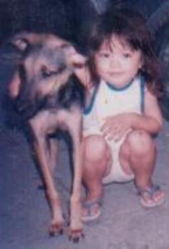 yla and gary - my daughter yla when she was about 3 and her protector, our dog gary