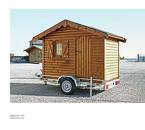 a mobile home - what is a real mobile home? is it one on a bus or car? or was it movable? it is new to me.
