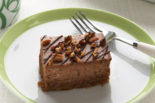 Chocolate Turtle Cheesecake - This is a photo of a piece of chocolate turtle cheesecake.