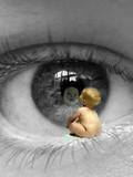 Mirror to your soul - A baby looking into the eye. A mirror to your soul.