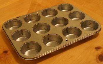 cupcake tin - Here is a cupcake tin in need of a clean