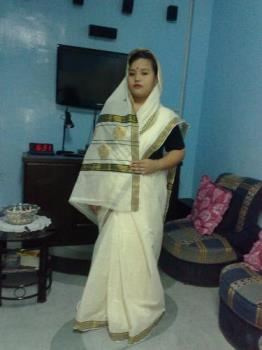 my daughter wearing saree - my daughter wearing a saree from kerala