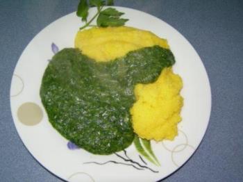 Urzici cu mamaliga - A highly appreciated Romanian plate, eaten during early spring: "urzici" (stinging nettle) with "mamaliga" (something made out of corn flower)