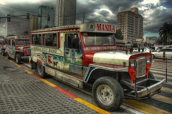 jeepney - This is a photo of an old jeepney in the street of Manila. It is a form of transportation for most of the filipinos.