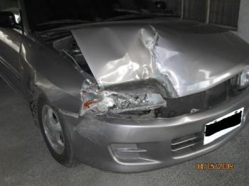 damaged car - damaged car as a result of using cellphone while driving