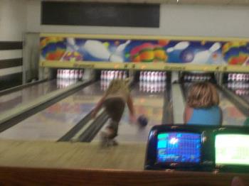 My Daughter Bowling - This picture is a little blurry but it one of my daughter bowling in her youth bowling league.