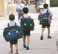 students heavy bags - students with heavy school bags.