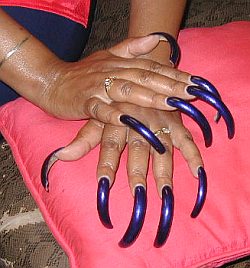 Long Nails - Long nails for me is not good to watch. It should be trimmed or at least be kept clean.