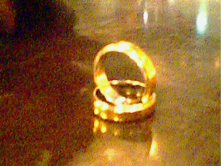 Our wedding ring - Gold ring and white gold on the side. Very simple wedding band. Our wedding ring - Gold ring and white gold on the side. Very simple wedding band.
