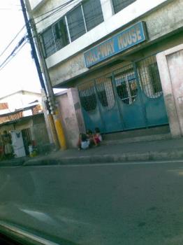children - children on the side of the busy street