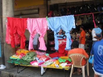 street vendors - street vending is common in our place especially on this street leading to a crowded church