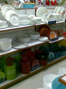 chinaware - plates, glasses, cups, etc. on display in a mall chinaware - plates, glasses, cups, etc. on display in a mall