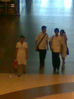 school uniform - medical students wearing their school uniform in a mall