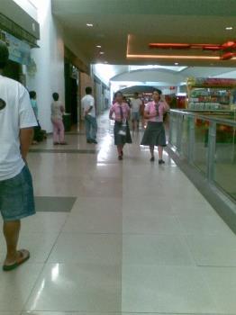 school uniform - college students in their school uniforms while in mall