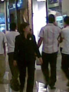 office uniform - lady in office uniform in a mall